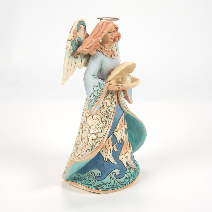 Angel Holding Shell Figurine