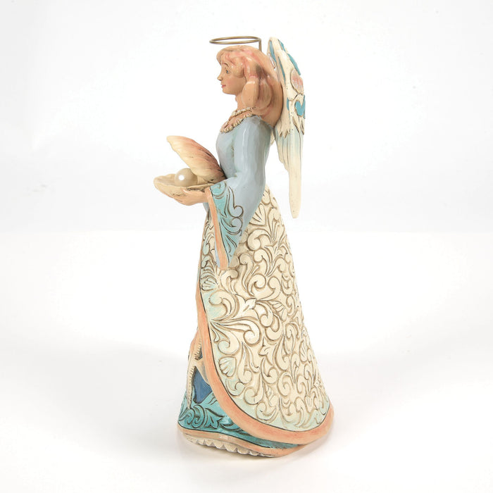 Angel Holding Shell Figurine