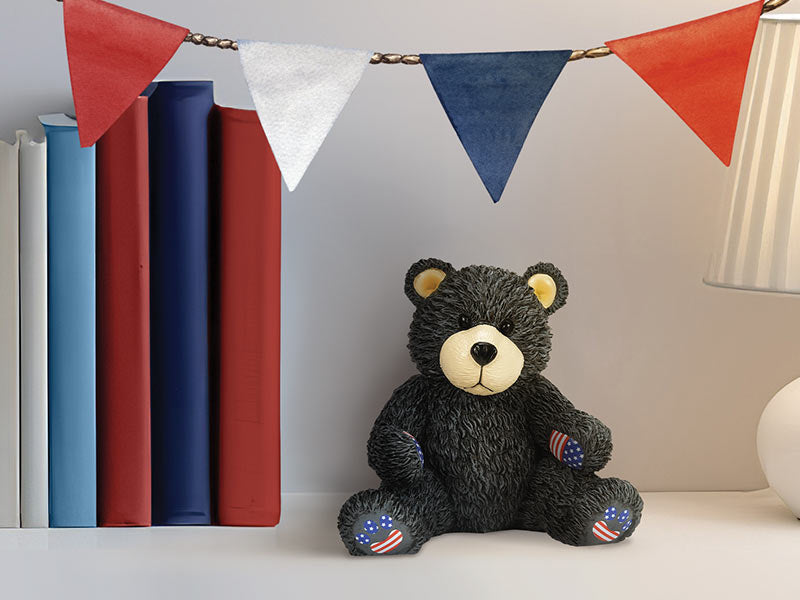 Boyds Bear on book shelf