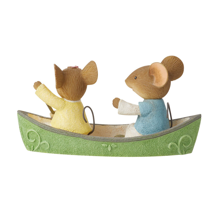 Canoeing couple mice figurine
